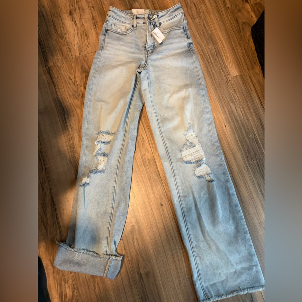 Light Wash Distressed Buckle Jeans